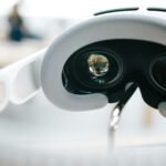 Close-up of smart AR glasses attached to a device, illustrating the rise of AR glasses