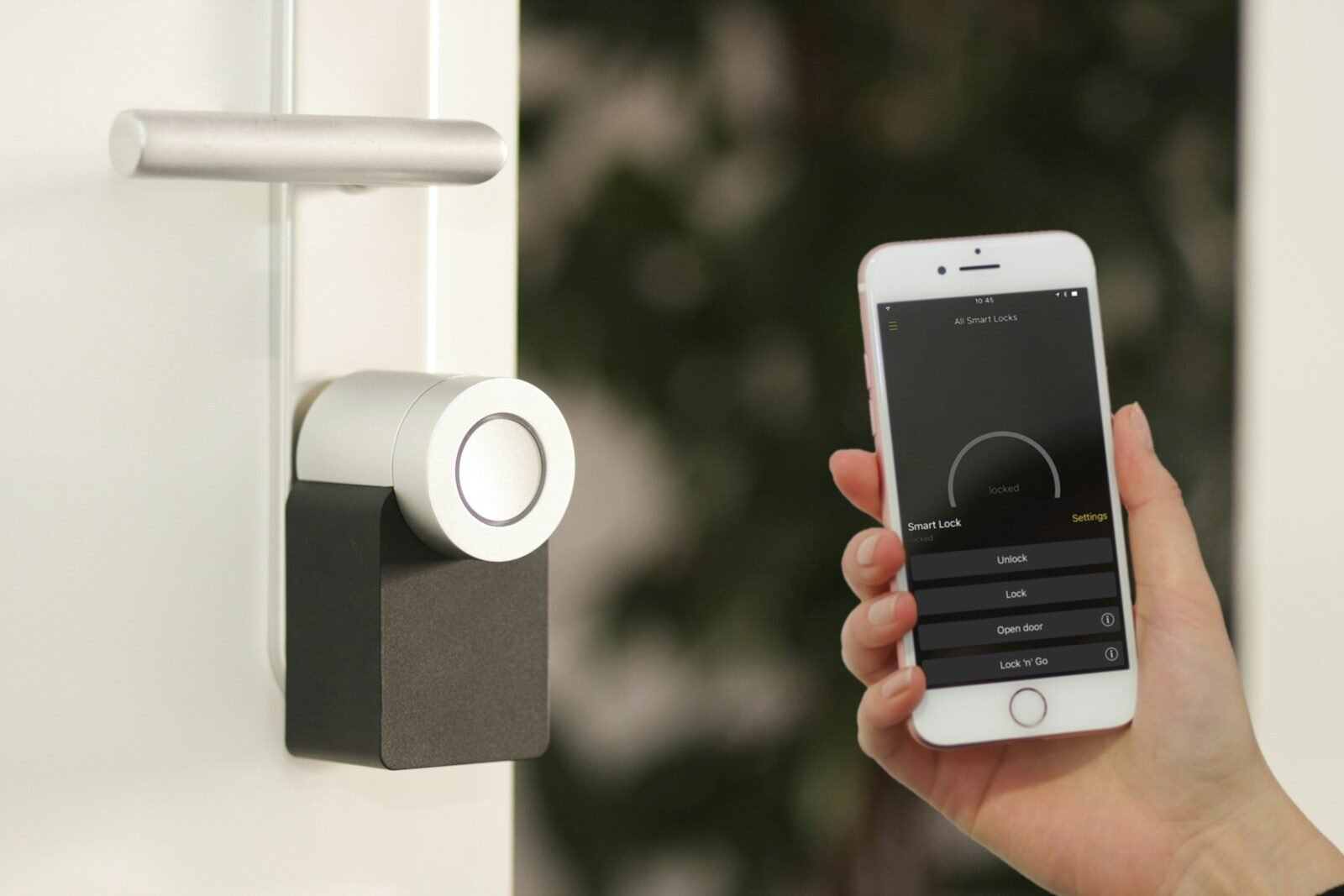 Smart door lock controlled from an iPhone app, illustrating Matter-compatible smart home devices